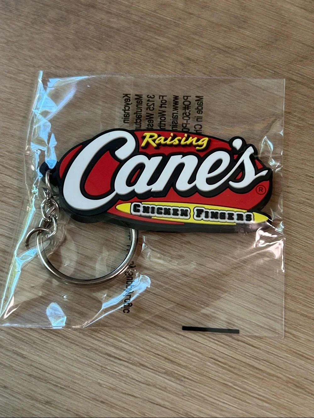 Raising Cane's Red Logo Lanyard with 2 Raising Cane’s Keychains bundle NEW